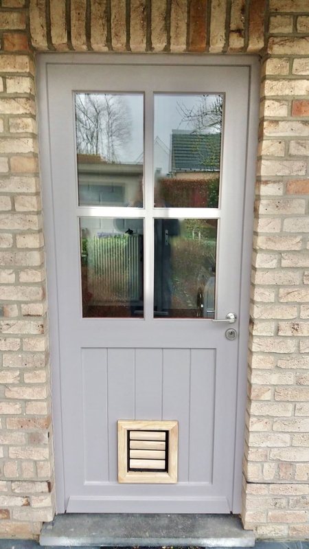 Cat Flap | Cat Door | Nipper (Small) Natural wood cat flap and dog flap for small dogs installed in a grey patio door | © Tomsgates